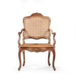 A Louis XV carved beech armchair