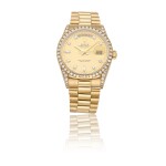 ROLEX | DAY-DATE 118388, A YELLOW GOLD AUTOMATIC WRISTWATCH WITH BAGUETTE DIAMOND DIAL AND DIAMOND BEZEL CIRCA 1985