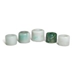 Five jade and jadeite archer's rings, 19th / 20th century