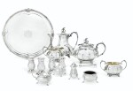 A silver-plated tea and coffee set, 20th century, a silver condiment set, Mappin & Webb, London, 1934, a Sheffield-plate salver, circa 1830 and four French silver-plated casters, 20th century