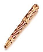 MONTBLANC | A LIMITED EDITION YELLOW GOLD, RUBY-SET AND RESIN FOUTAIN PEN, CIRCA 1997