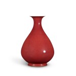 A copper-red glazed vase, Yuhuchun ping, Seal mark and period of Qianlong | 清乾隆 紅釉玉壺春瓶 《大清乾隆年製》款