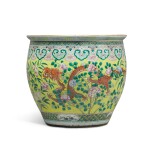 A large yellow-ground famille-rose fish bowl, 19th / 20th century