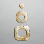 Three greyish-celadon jade discs, bi,  Neolithic period, Hongshan culture | 新石器時代 紅山文化 青灰玉璧三件 
