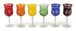 A BOHEMIAN HARLEQUIN SUITE OF COLORED AND CUT WINE GLASSES, LATE 19TH/ 20TH CENTURY