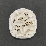 A WHITE JADE RETICULATED 'BIRD AND FLOWER' PLAQUE SONG - YUAN DYNASTY | 宋至元 白玉鏤雕花鳥紋杏形珮飾