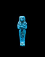 An Egyptian Brilliant Blue Faience Ushabti of Userhatmes, 21st Dynasty, 1075-944 B.C.