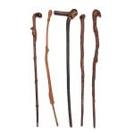 Group of Five American Carved Wooden Canes, Late 19th Century