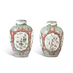 A Pair of Chinese Iron-Red-Ground Famille-Verte 'Birds and Antiques' Ovoid Jars and Covers, Qing Dynasty, Kangxi Period