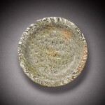 A marbled pottery dish, Tang dynasty | 唐 絞胎盤