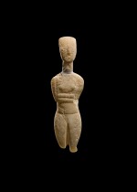 A Cycladic Marble Figure of a Goddess, Early Bronze Age II, circa 2600-2500 B.C.