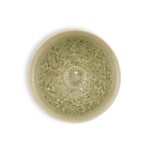 A small moulded Yaozhou celadon 'chrysanthemum' bowl, Northern Song dynasty | 北宋 耀州青釉印菊紋笠式盌