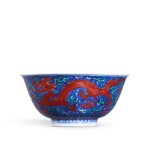 A fine blue-ground polychrome enamel 'dragon' bowl, Mark and period of Kangxi | 清康熙 藍地紅綠彩趕珠雲龍圖盌 《大清康熙年製》款