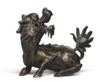 A CHINESE BRONZE FIGURE OF A MYTHICAL BEAST, QING DYNASTY, 19TH CENTURY