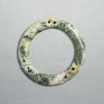 A celadon jade three-section bracelet, Neolithic period, Liangzhu culture | 新石器時代 良渚文化 青玉三聯鐲