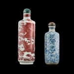 An underglaze-red 'dragon' snuff bottle and a blue and white 'lotus' snuff bottle, Qing dynasty, 19th century | 清十九世紀 釉裏紅龍紋鼻煙壺 及 青花纏枝蓮紋鼻煙壺一組兩件 《大清雍正年製》仿款