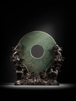 An imperial massive Khotan-green jade bi disc with original bronze 'dragon' stand, Qing dynasty, Qianlong period | 清乾隆 御製鑄銅江山一統雙龍座和闐青玉大玉璧