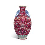 An extremely rare ruby-ground famille-rose 'phoenix'-handled vase, Seal mark and period of Qianlong | 清乾隆 洋彩胭脂紫地暗八仙雙鳳耳瓶 《大清乾隆年製》款