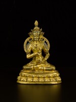 A gilt-copper alloy figure of Vajrasattva Tibet, 14th century | 西藏 十四世紀 鎏金銅合金金剛薩埵坐像