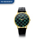REFERENCE 1038/1 A GOLD WRISTWATCH WITH MALACHITE AND ONYX CHECKERBOARD DIAL, MATCHING GOLD AND STONE CUFFLINKS, CIRCA 1990’S