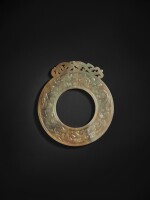 An extremely rare and important archaic green jade 'chilong' disc (Bi), Han dynasty | 漢 玉螭龍紋璧