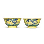 A pair of yellow-ground famille-rose 'dragon' cups, 19th / 20th century | 十九 / 二十世紀 黃地粉彩龍紋小盃一對