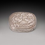 A repoussé and engraved 'phoenix' box and cover, Tang dynasty | 唐 銀捶揲鳳穿花紋蓋盒