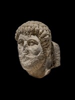A Roman Limestone Head of a Man, circa 4th/5th Century A.D