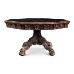 AN EARLY VICTORIAN NEO-GOTHIC CARVED OAK OCTAGONAL LIBRARY TABLE, MID-19TH CENTURY