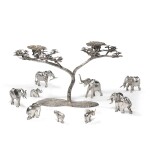 A Zimbabwean Silver Acacia Tree Two-Light Candelabrum and Nine Elephants, Patrick Mavros, Harare, 2006 and circa