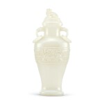 A white jade archaistic vase and cover, Qing dynasty | 清 白玉仿古活環龍耳蓋瓶