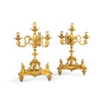 A pair of Louis XV gilt-bronze four-light candelabra, French Régence, attributed to the workshop of A-C. Boulle and sons, circa 1745-1749