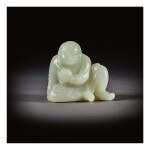 A PALE CELADON JADE FIGURE OF A SEATED LUOHAN,  QING DYNASTY, 18TH CENTURY