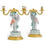 A pair of French gilt-bronze mounted porcelain two-light candelabra, late 19th century, the porcelain probably Samson