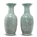 A large pair of celadon-ground slip-decorated vases Qing dynasty, 19th century