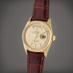 Reference 1806 Day-Date ‘Florentine’ | A yellow gold automatic wristwatch with day, date, and textured linen etched case, Circa 1960