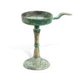 A bronze 'dragons' oil lamp, Han dynasty | 漢 青銅龍紋油燈