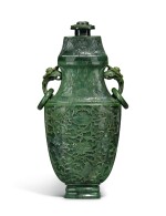 A large spinach jade vase and cover, Qing Dynasty, Qianlong period | 清乾隆 碧玉番蓮八吉祥紋活環耳蓋瓶