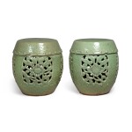 A pair of pierced and carved 'Longquan' celadon-glazed garden seats, Ming dynasty | 明 龍泉窰青釉開光鏤空花卉紋坐墩一對