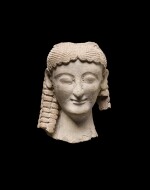 A Greek Terracotta Head of a Goddess, Magna Graecia circa late 6th/early 5th Century B.C