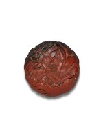 A carved cinnabar lacquer 'peony' box and cover, Ming dynasty, 16th century | 明十六世紀 剔紅牡丹紋印盒