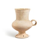 A white pottery goblet, Dawenkou culture, 4300-2400 B.C. 大汶口文化 白陶高腳盃