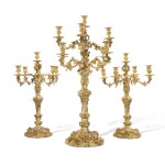 A Victorian silver-gilt suite of candelabra, R&S Garrard & Co., London, 1848 (the pair) and 1861 (the larger)