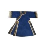 A blue-ground gauze 'dragon' lady's robe, Late Qing dynasty | 清末 藍地納紗暗花團龍紋氅衣 