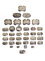 A COLLECTION OF THIRTY-SIX SILVER BOTTLE LABELS, VARIOUS MAKERS, LONDON AND BIRMINGHAM, CIRCA 1770-1896