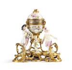 A Louis XV gilt-bronze mounted Meissen porcelain mantel clock, the movement 19th century | Pendule à cercles tournants en porcelaine de Meissen et bronze doré d'époque Louis XV, le mouvement XIXe siècle