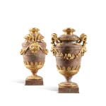 A pair of Louis XVI style gilt-bronze mounted marble vases