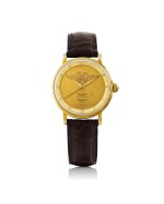 UNIVERSAL GENÈVE | MADE FOR SCANDINAVIAN AIRLINES SYSTEM: POLAROUTER DELUXE, REF 10234/1  YELLOW GOLD WRISTWATCH CIRCA 1955