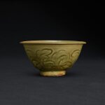 A Yaozhou celadon carved 'peony' bowl, Northern Song dynasty 北宋 耀州窰青釉刻牡丹紋盌