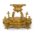 A LATE LOUIS XIV GILT-METAL SURTOUT DE TABLE, PROBABLY ITALIAN, EARLY 18TH CENTURY